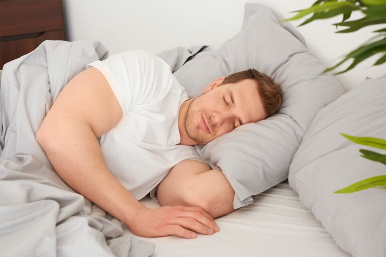 man-sleeping-comfortable-bed